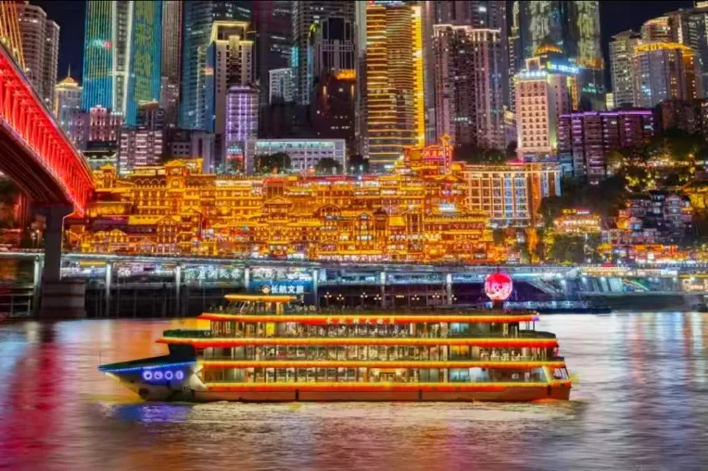 Two Rivers Cruise vessel and Chongqing skyline at night
