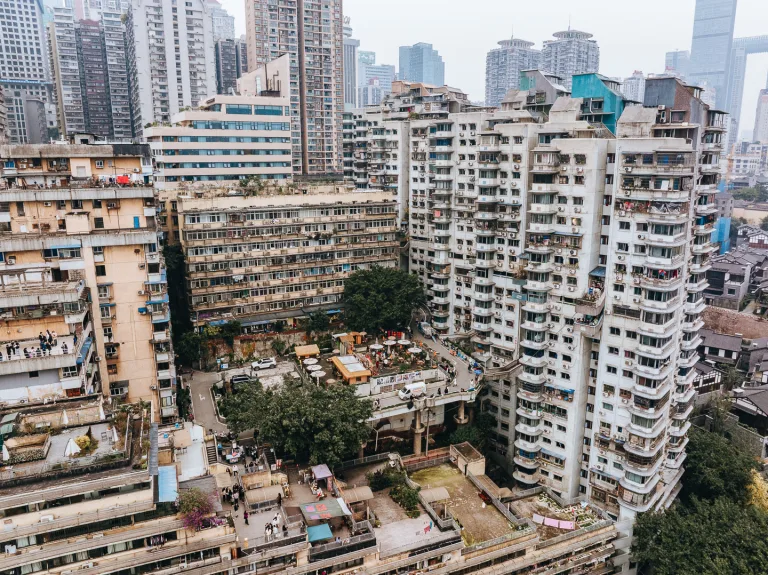 Explore hillside homes, neighborhood paths and public spaces shaped by Chongqing’s steep terrain and everyday local life.