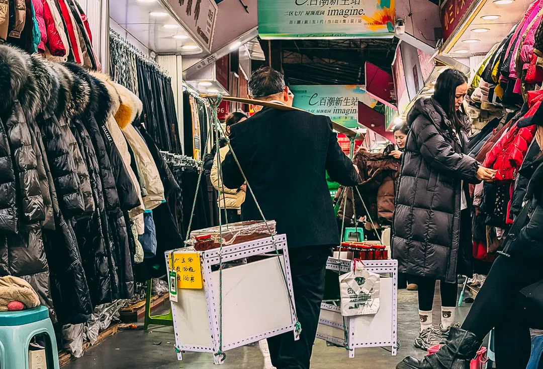A narrow aisle inside Chaotianmen wholesale market in Chongqing