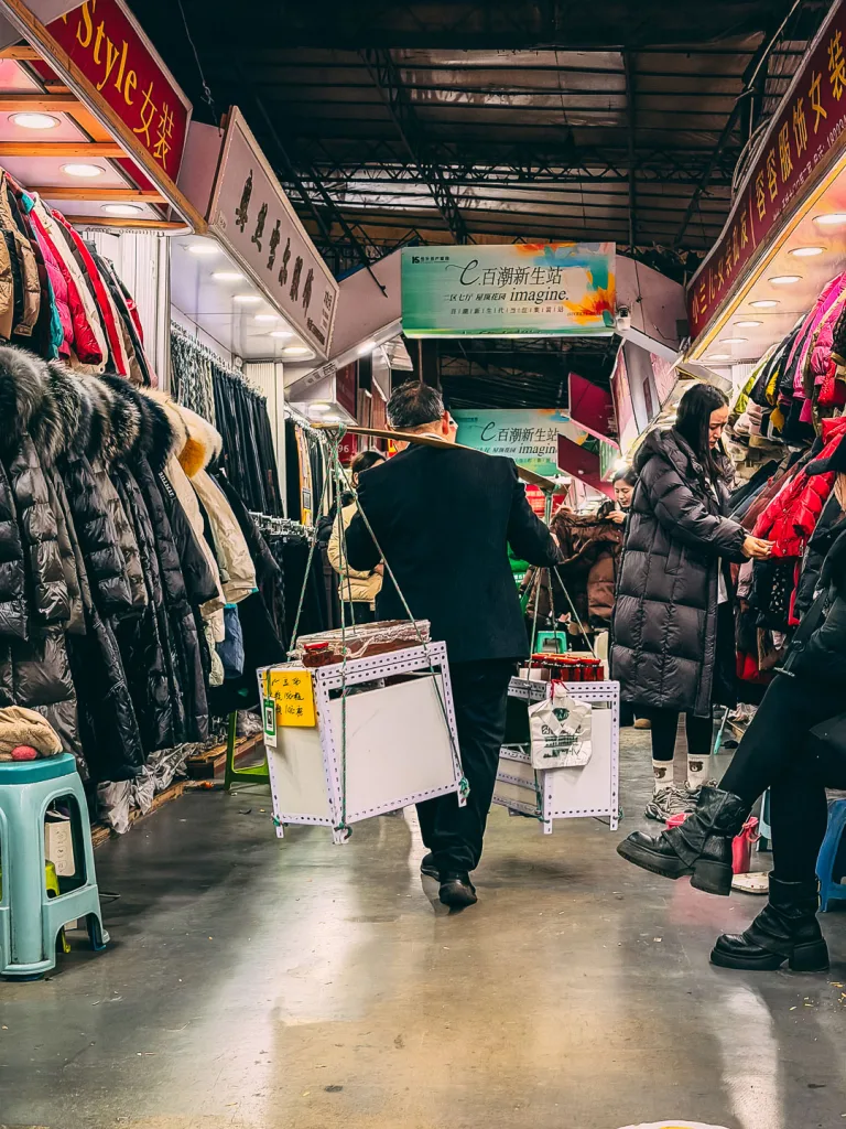 A narrow aisle inside Chaotianmen wholesale market in Chongqing