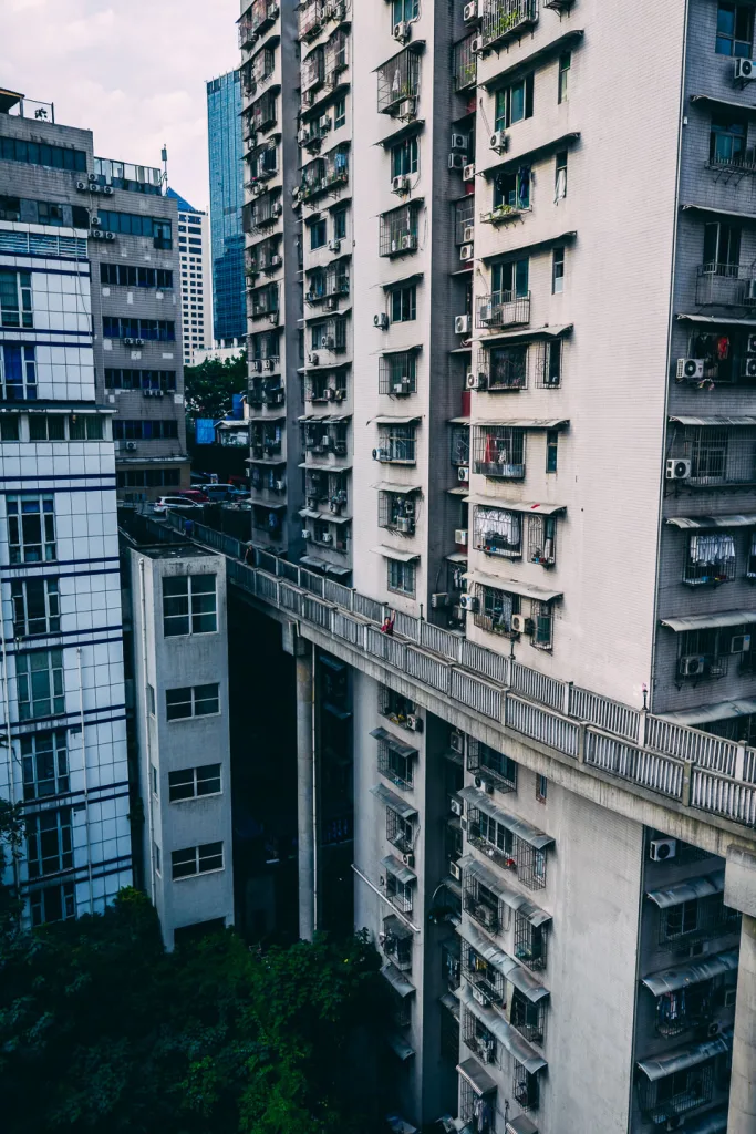 A roadway suspended between dense apartment buildings in Chongqing