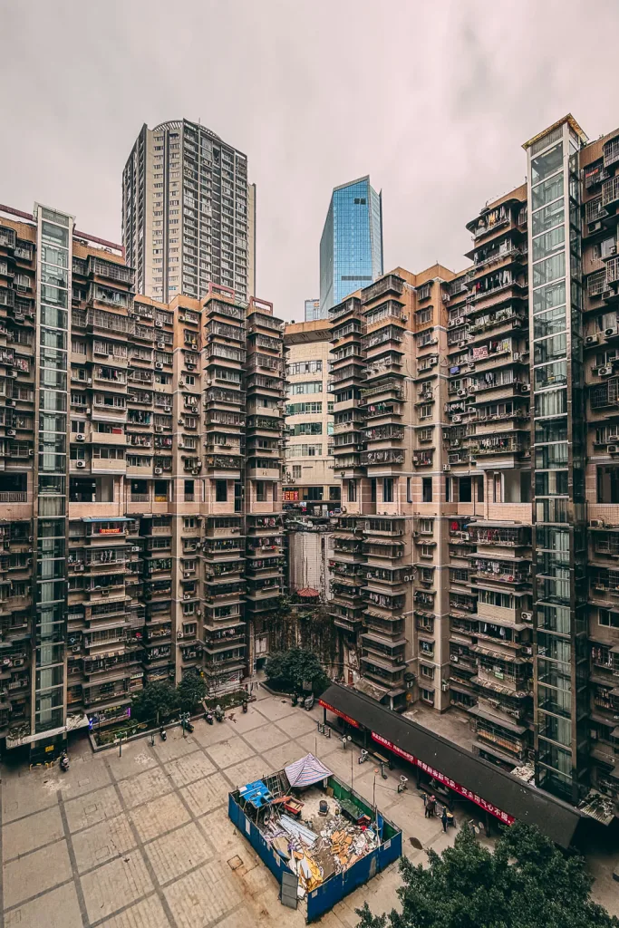 Dense high-rise apartments surrounding City Garden in Chongqing