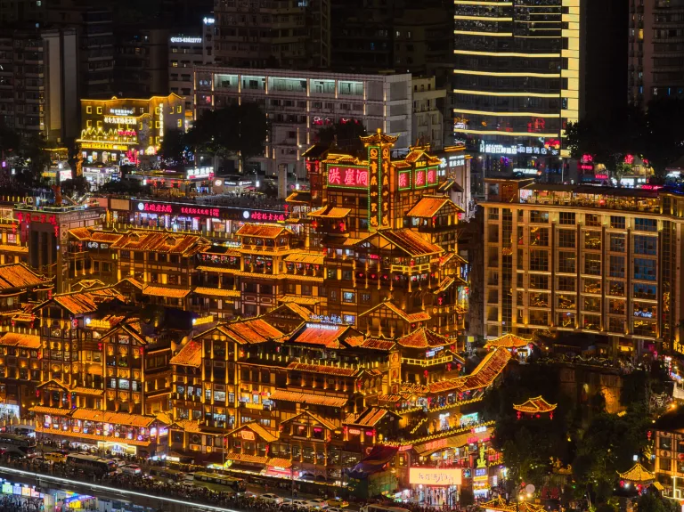 Watch the city transform as bridges and towers light up.
