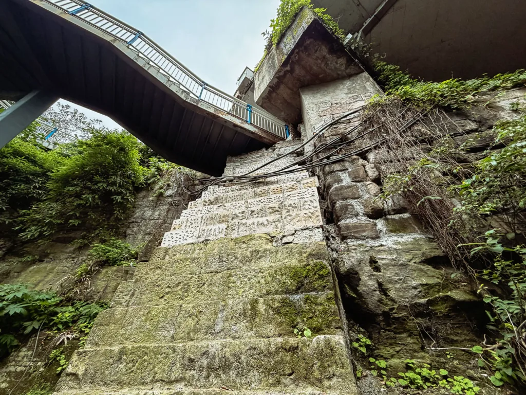 Steep stone steps and layered walkways in an old Chongqing neighbourhood