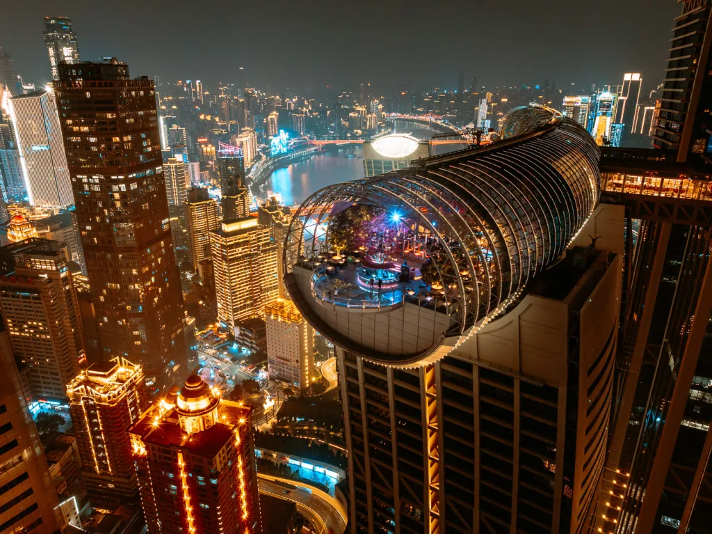 InterContinental Chongqing Raffles City crystal walkway illuminated at night
