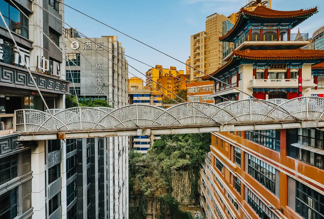 Elevated pedestrian bridges crossing between high-rise buildings at Kuixinglou in Chongqing