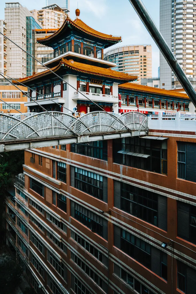 Elevated pedestrian bridges crossing between high-rise buildings at Kuixinglou in Chongqing