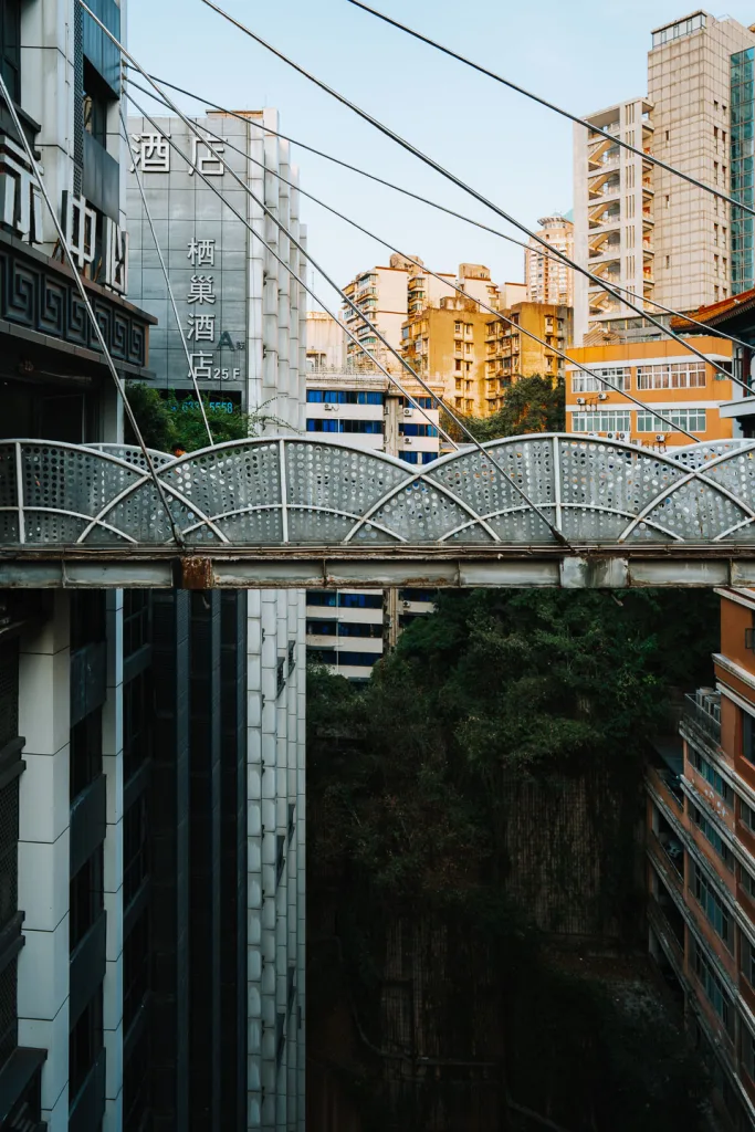 Elevated pedestrian bridges crossing between high-rise buildings at Kuixinglou in Chongqing