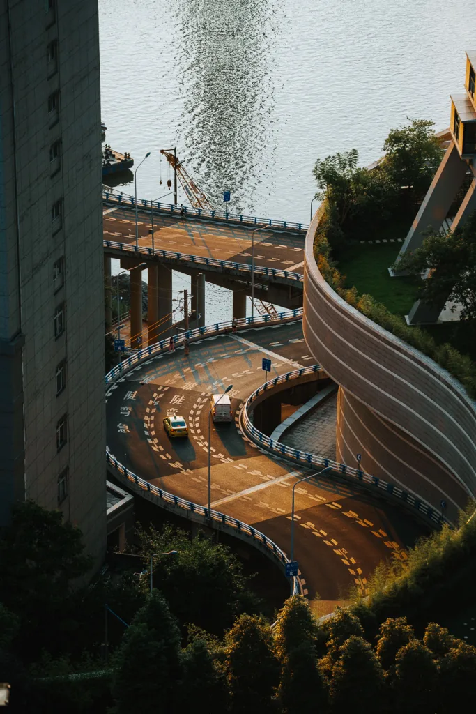 The curved elevated road winding beside Raffles City Chongqing