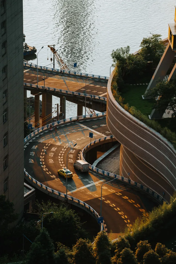 The curved elevated road winding beside Raffles City Chongqing