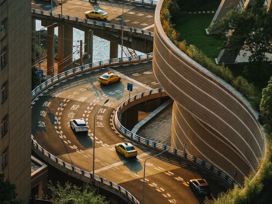 The curved elevated road winding beside Raffles City Chongqing
