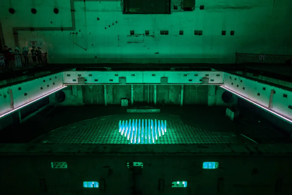 The illuminated underground tunnels and industrial spaces of Chongqing 816 Nuclear Plant