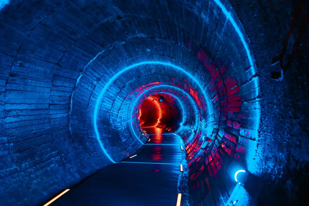 The illuminated underground tunnels and industrial spaces of Chongqing 816 Nuclear Plant