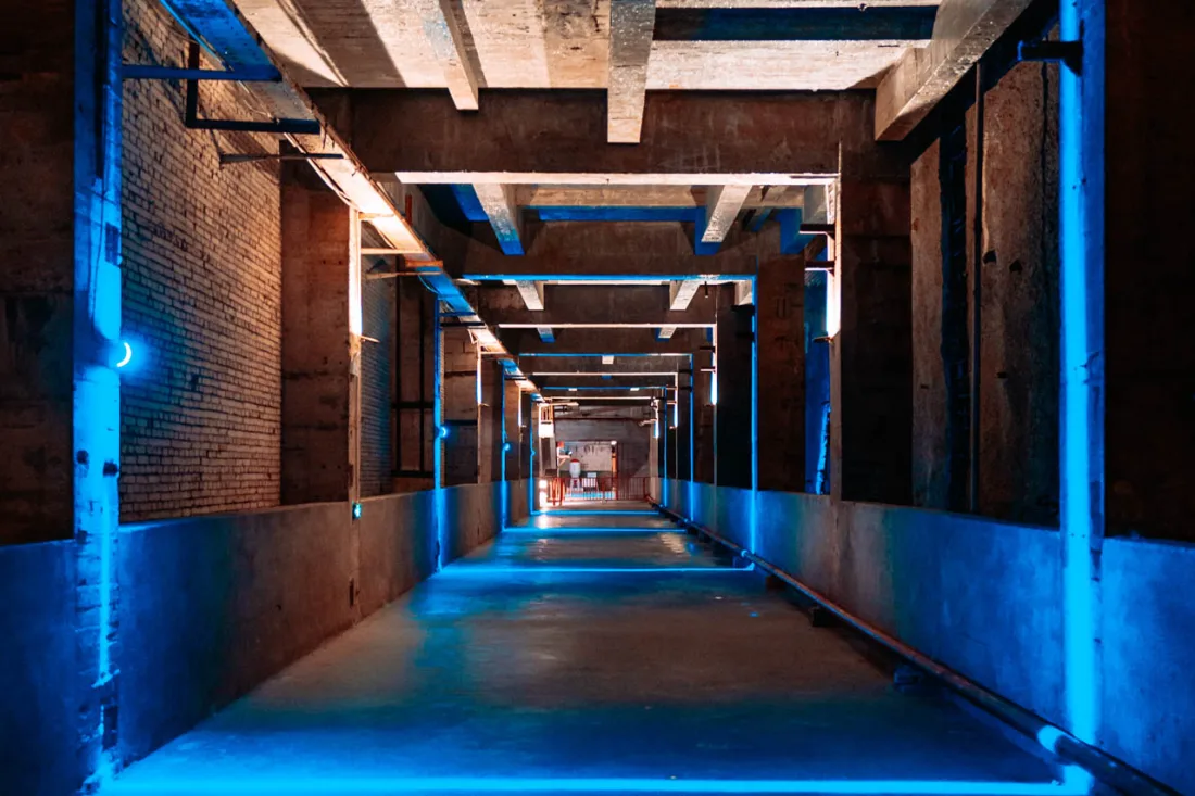 The illuminated underground tunnels and industrial spaces of Chongqing 816 Nuclear Plant