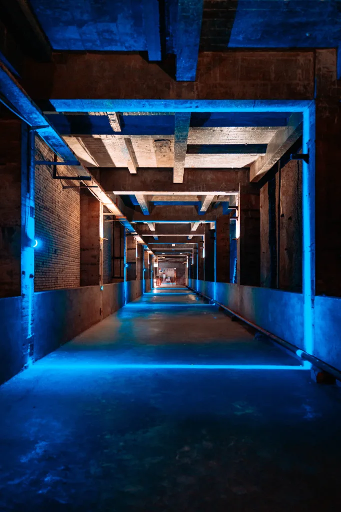 The illuminated underground tunnels and industrial spaces of Chongqing 816 Nuclear Plant
