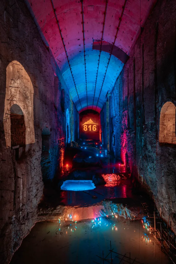The illuminated underground tunnels and industrial spaces of Chongqing 816 Nuclear Plant