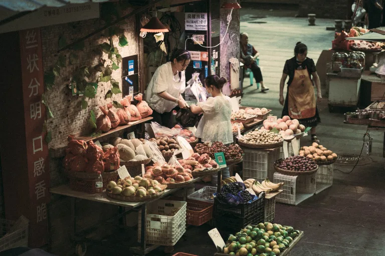 Pass wet markets, residential lanes and neighborhood shops where spices, snacks and daily routines reveal local character.