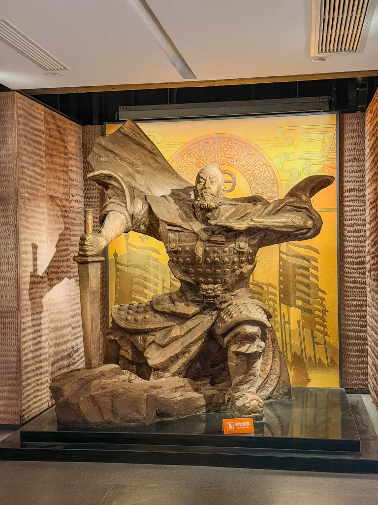 Historic warrior relief inside Ba Manzi Tomb in Chongqing