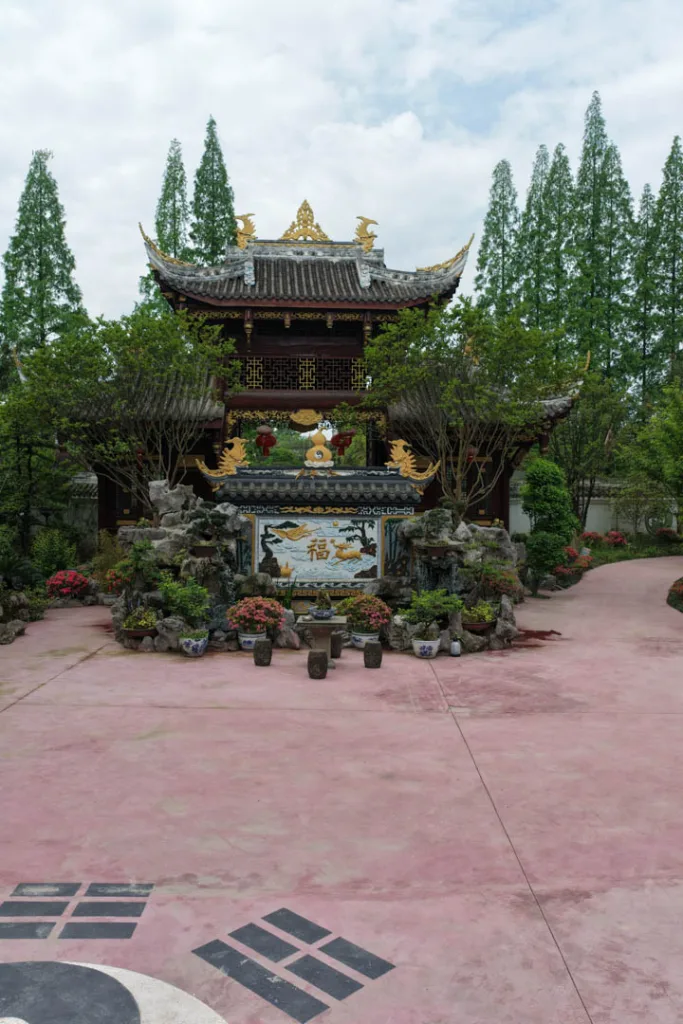 Traditional temple halls and courtyards surrounded by greenery in Chongqing