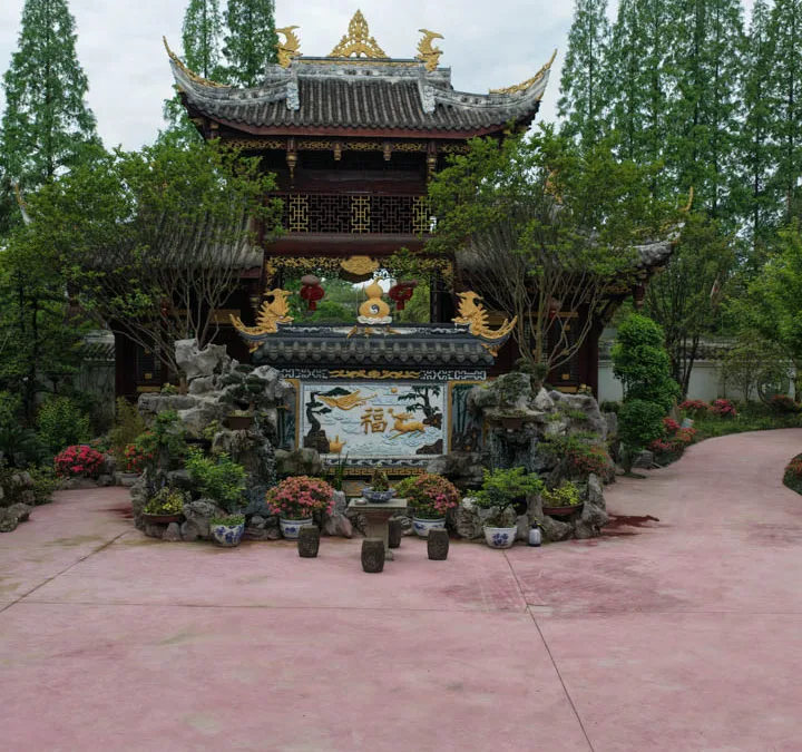 Traditional temple halls and courtyards surrounded by greenery in Chongqing