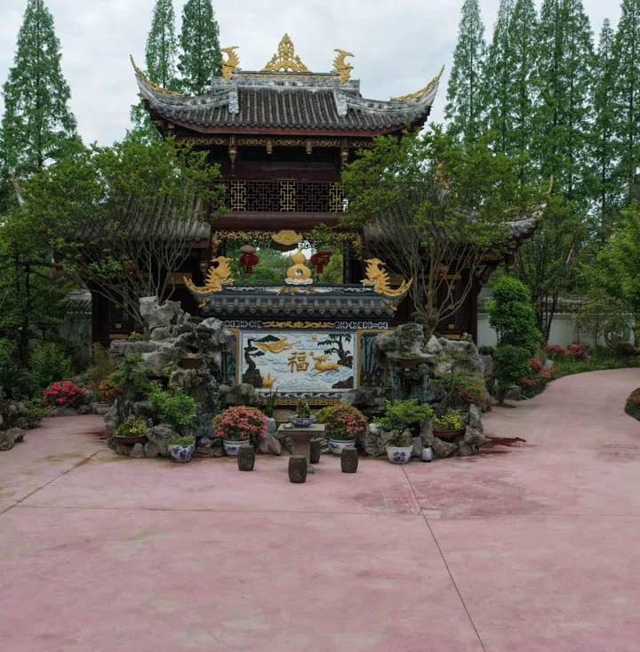 Traditional temple halls and courtyards surrounded by greenery in Chongqing