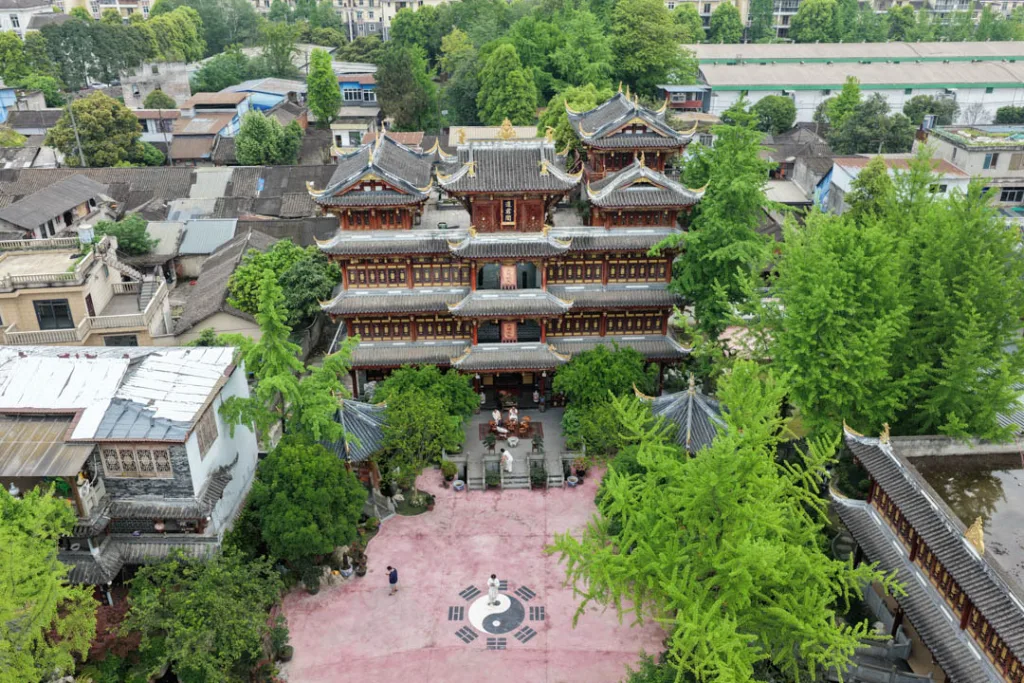 Traditional temple halls and courtyards surrounded by greenery in Chongqing