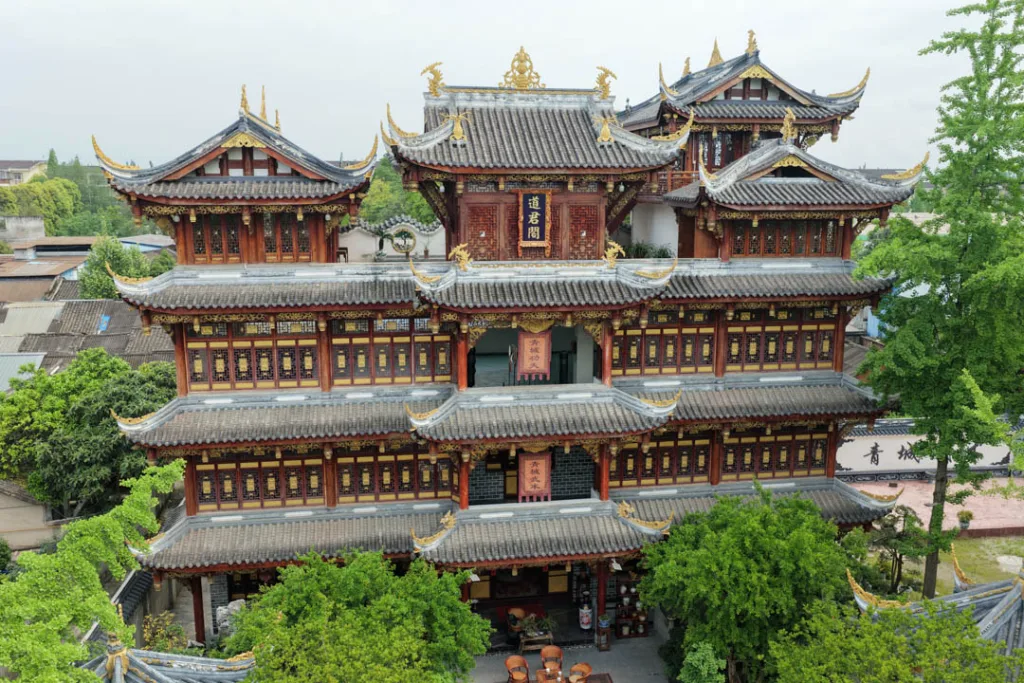 Traditional temple halls and courtyards surrounded by greenery in Chongqing