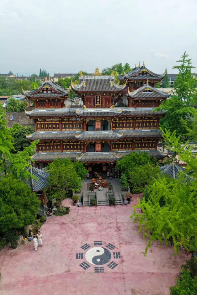 Traditional temple halls and courtyards surrounded by greenery in Chongqing