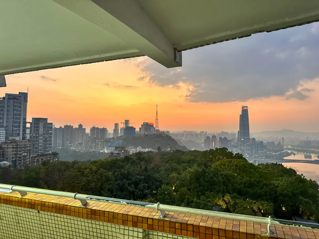 Sunset over Chongqing seen from the hillside at Eling Park