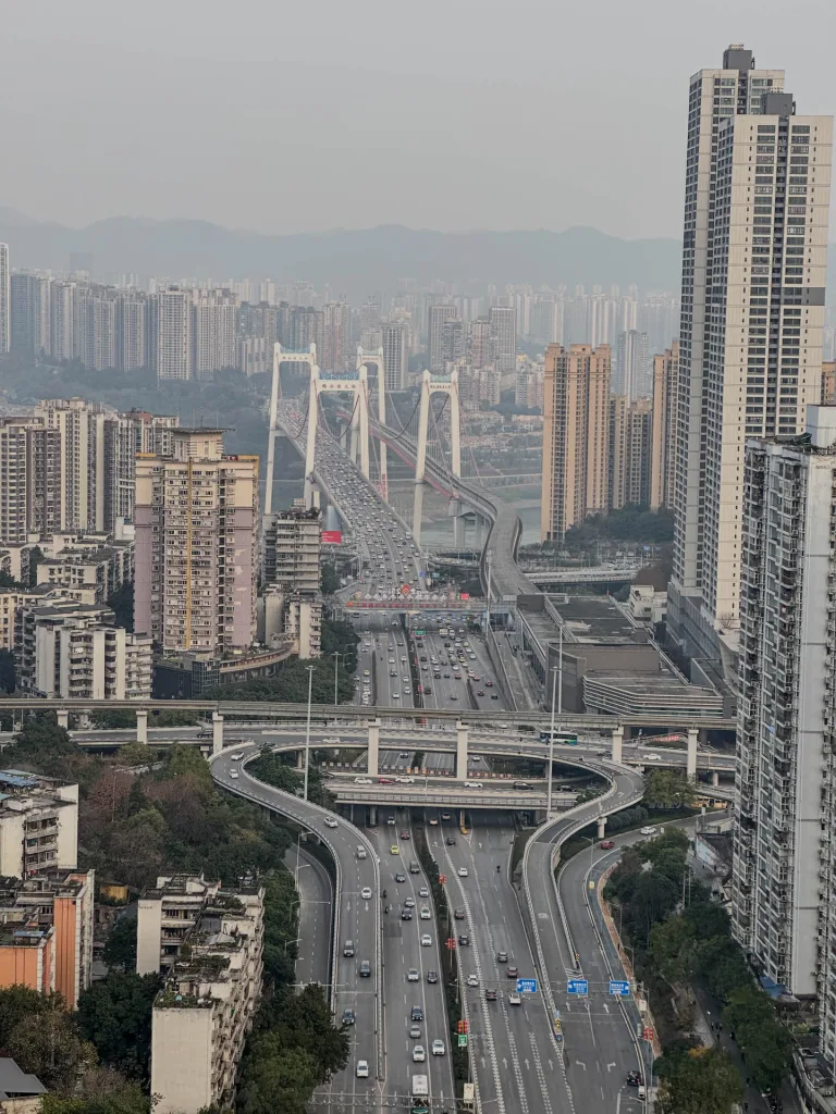 Elevated roads winding between high-rise buildings in Chongqing