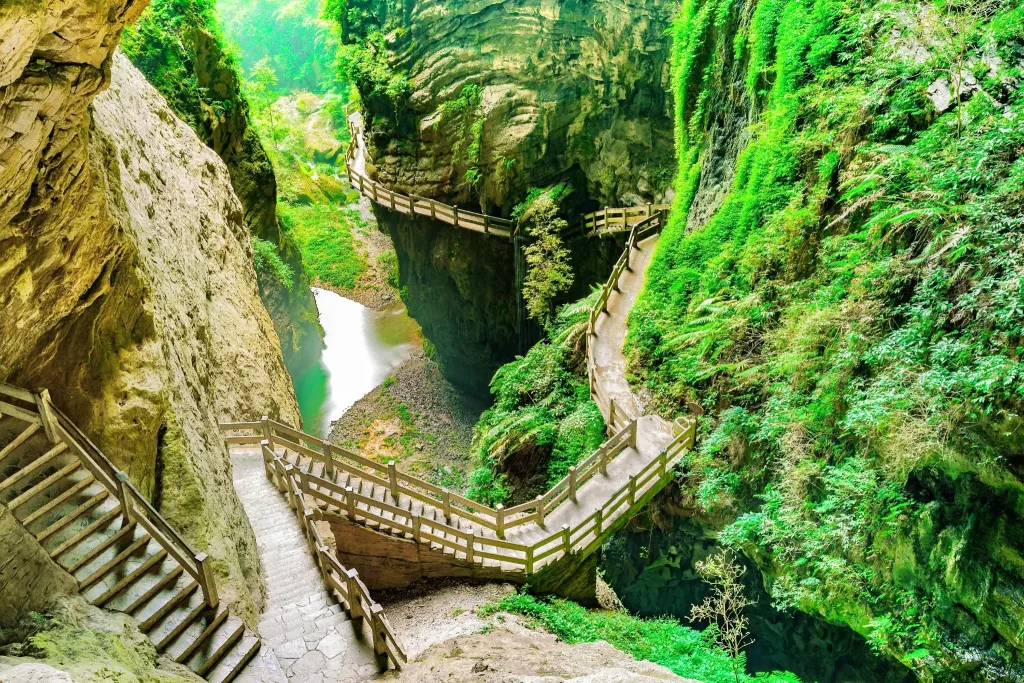 Waterfalls, cliffs and forest walkways inside Longshuixia Fissure Gorge in Wulong