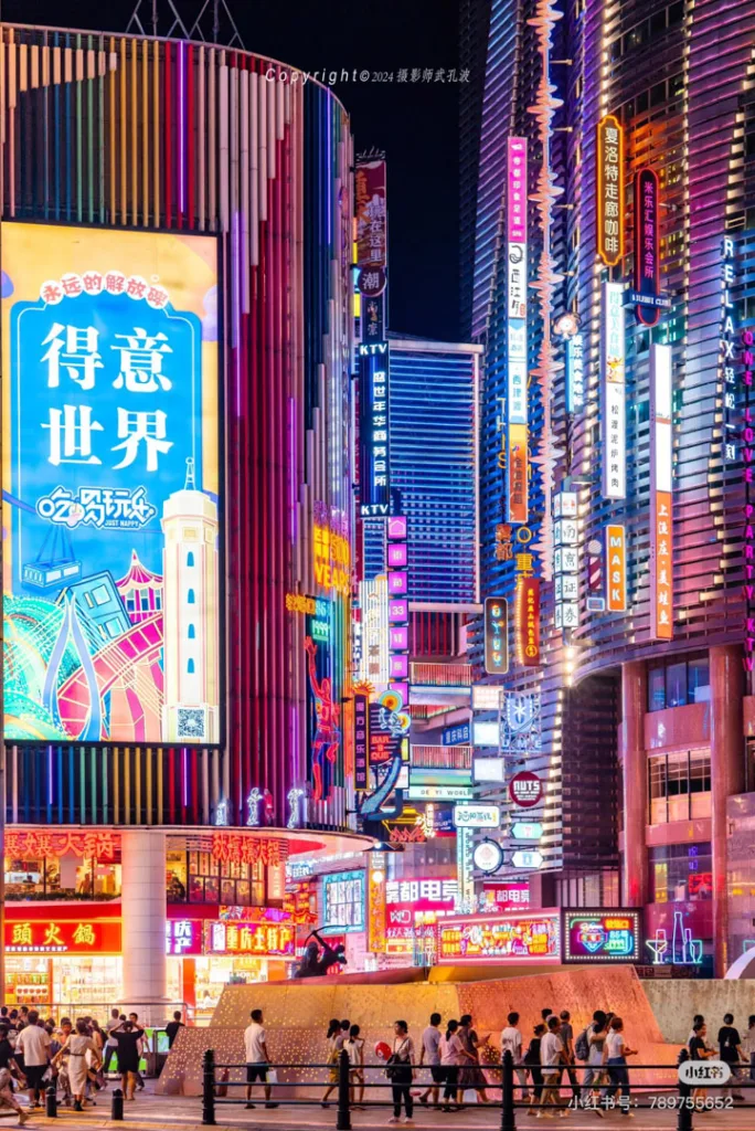 A traveller posing among Chongqing skyscrapers, neon lights and riverside night views