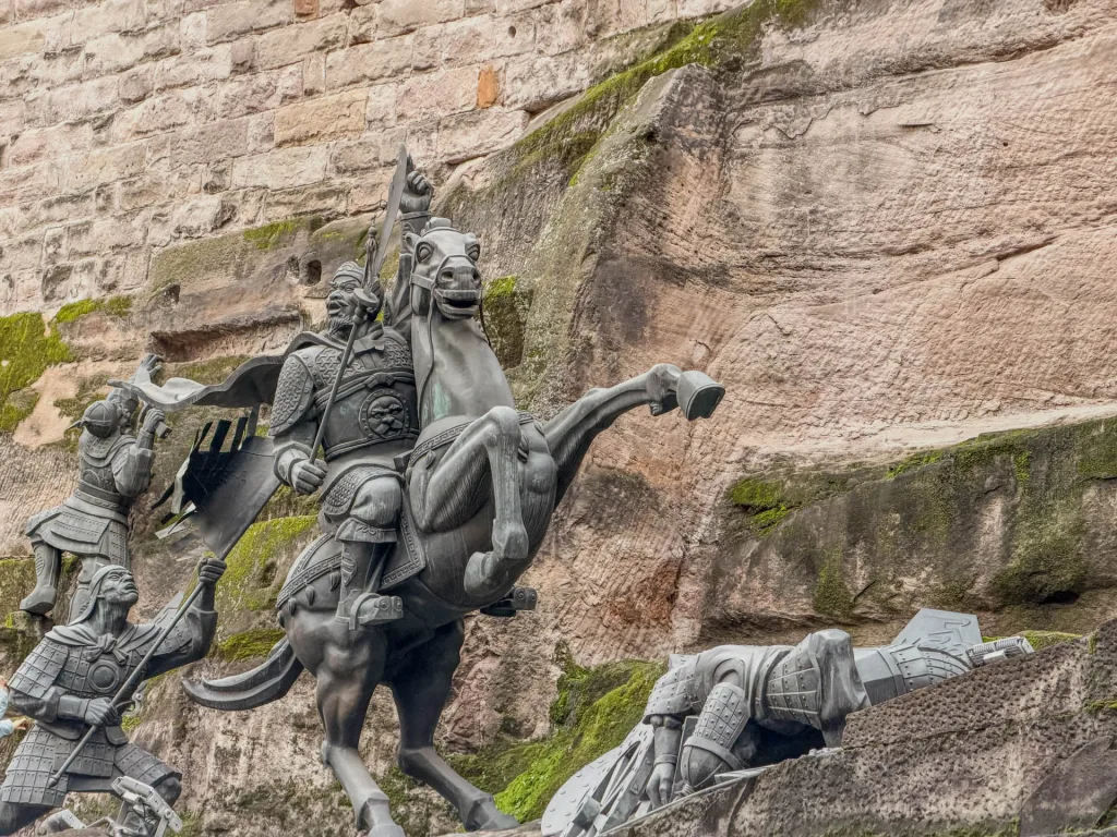 Historic stone walls, steps and sculptures at Tongyuan Gate in Chongqing