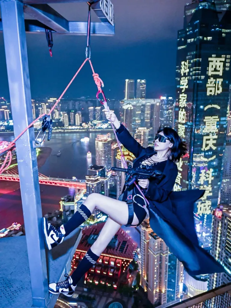A traveler in cyberpunk styling suspended above Chongqing’s illuminated skyline at night
