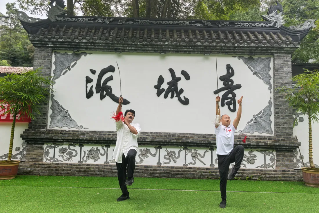 Guests practising Kung Fu in a traditional Sichuan courtyard