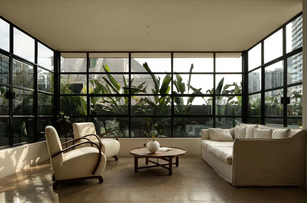 Plant-filled rooftop lounge at SOMMET Rooftop Hotel Chongqing