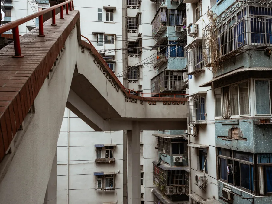 Elevated walkways and stacked residential buildings along Linhua Road in Chongqing